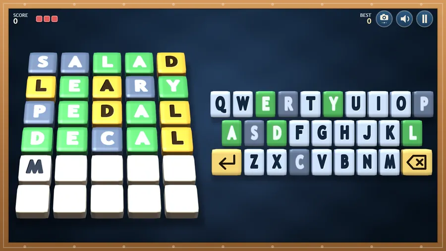 The on-the-table view: the board lying back with SALAD, LEARY, PEDAL and DECAL guessed and M typed next, beside the keyboard