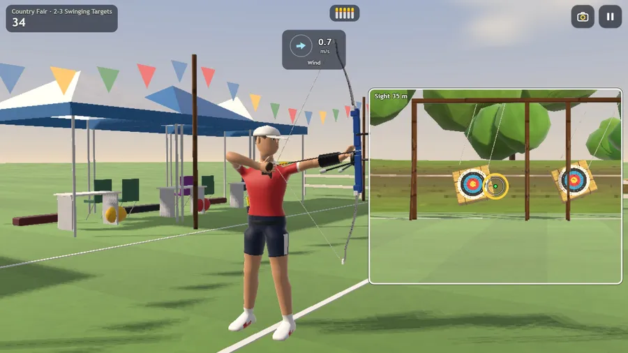 TV view of an archer at a country fair, shooting at two targets swinging from wooden gallows.