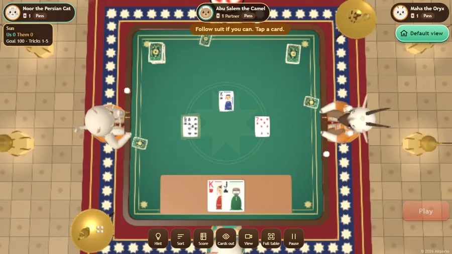 The full-table view: the whole table seen from above with all four hands, the played cards and the won-trick piles