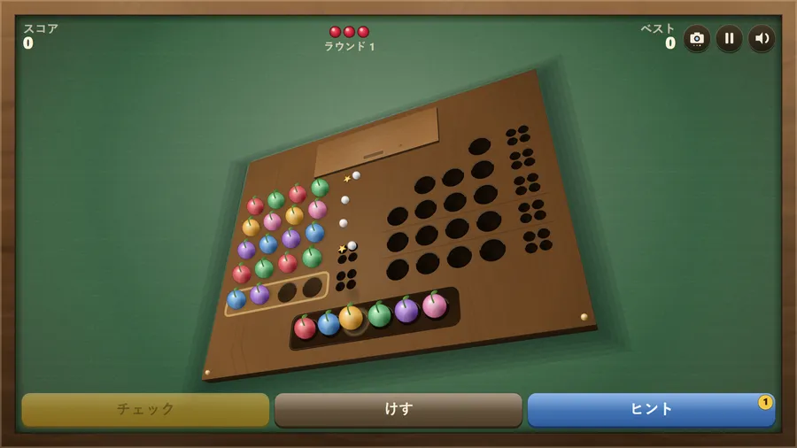 Corner view in Japanese: the board at three-quarters, guessed rows with marks, empty rows and the berry tray