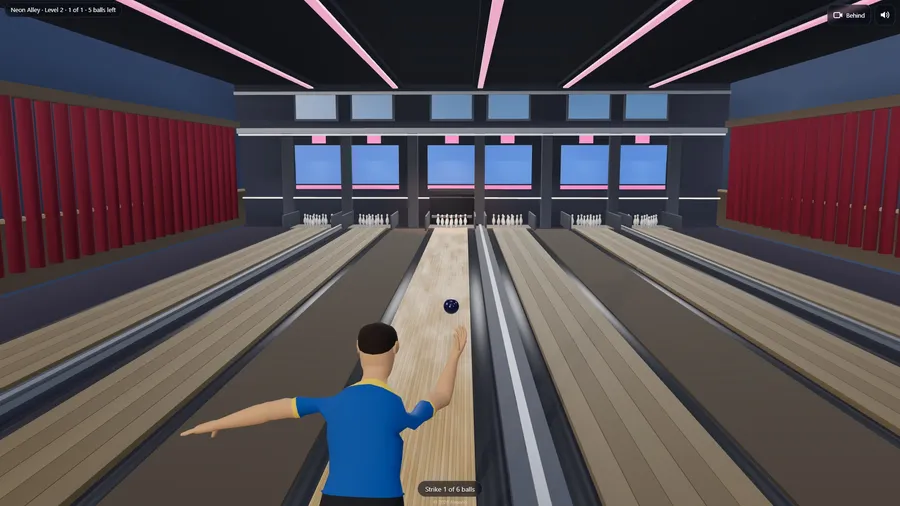 The bowler's follow-through with the ball rolling away down the lane towards the pins