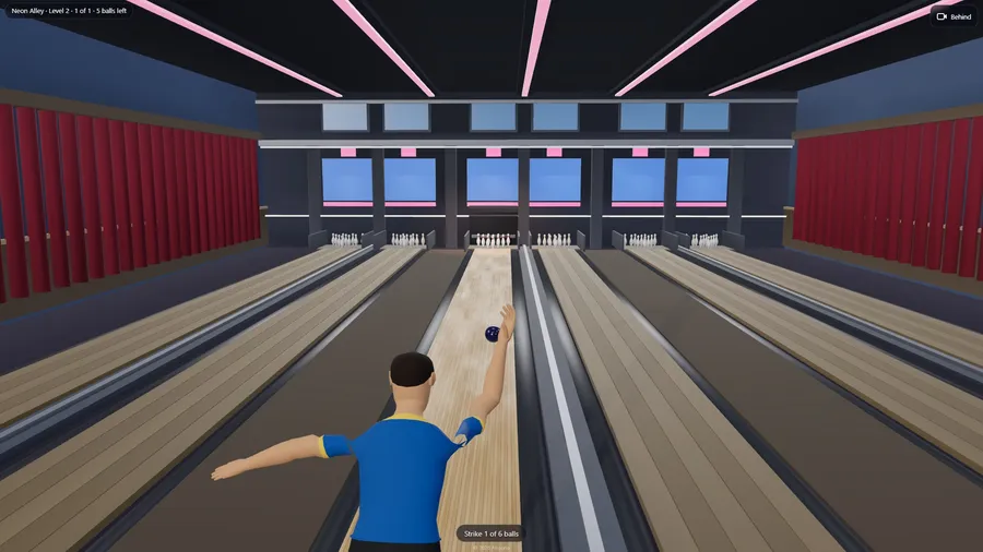 The bowler's follow-through with the ball rolling away down the lane towards the pins