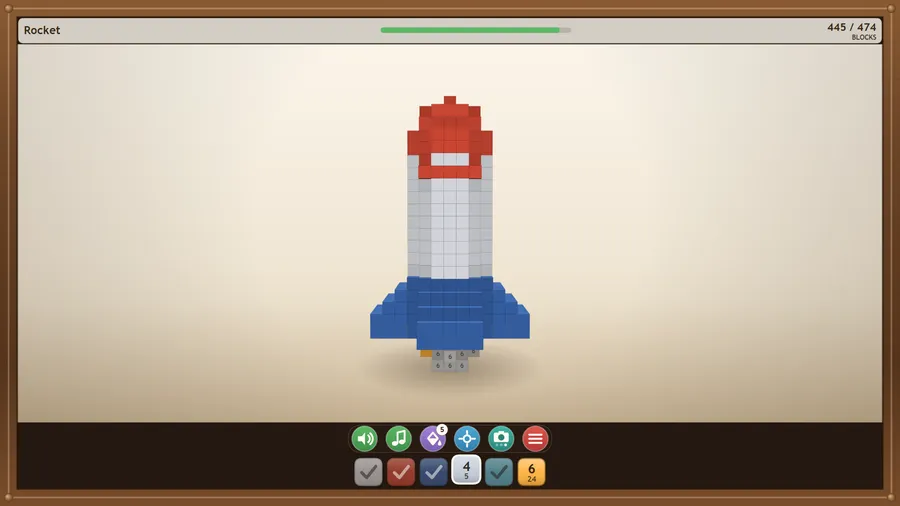 A nearly painted block rocket seen straight on, 445 / 474 blocks, pots 4 and 6 still to go