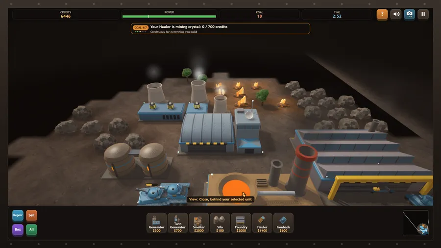 The Close camera behind a blue tank, looking over generators, a smelter and a large foundry in 3D.
