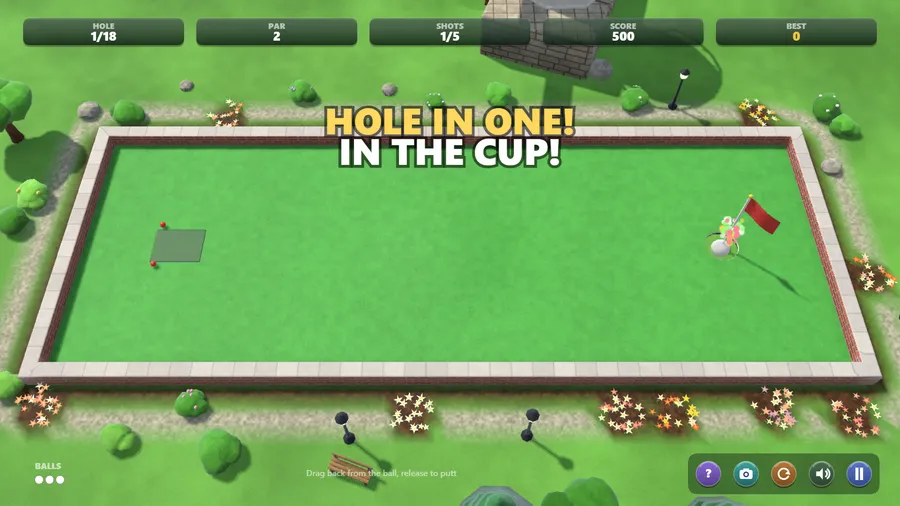 A big "Hole in one! In the cup!" banner as the ball drops beside the flag and the score reaches 500.
