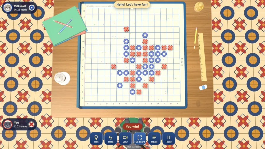 A win: the player has lined up five red X marks, with confetti over the notebook board and You win shown.
