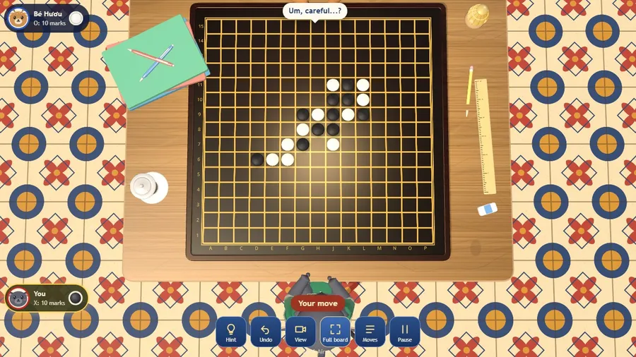 Glossy black and white stones on a lacquer board with gold grid lines, a different look from the notebook.