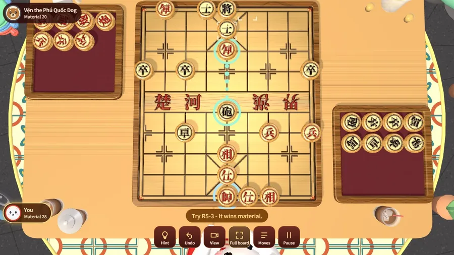 Mid-game against the Phú Quốc dog: a hint shown as green rings and a dotted path, captured pieces in the tray.