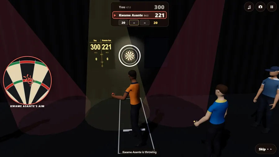 The whole room at the Grand Hall: the opponent aiming on a dark stage under coloured lights.