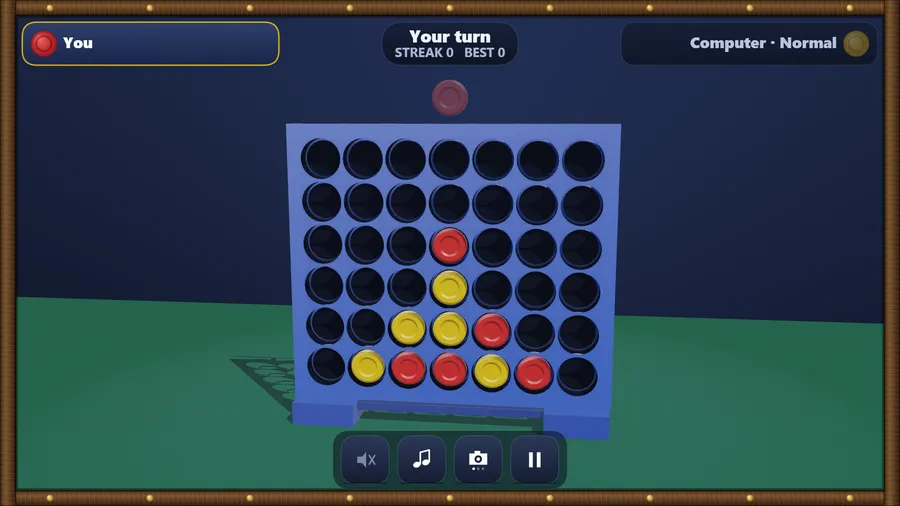 The rack face on: a blue 7x6 board on a green table, red and yellow discs in the middle columns; Your turn
