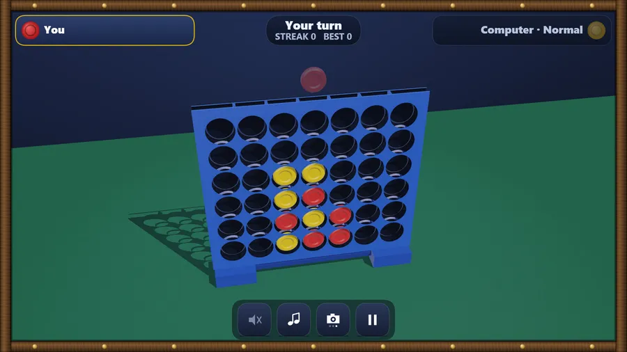 The high view: looking down into the rack's columns, red and yellow discs stacked in the middle; Your turn