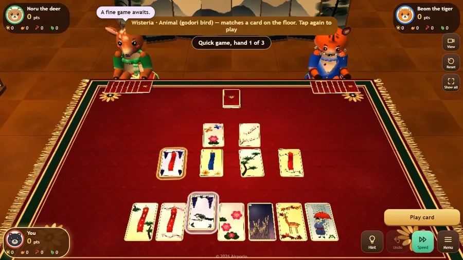 Opening hand: a deer and a tiger face you across the mat, seven flower cards in your hand and a hint on the chosen card.