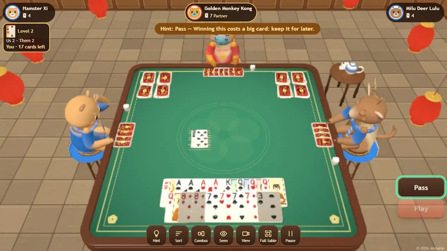 A hint highlights a pair of kings to play, with the reason shown in the status line