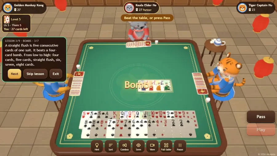 A Bomb! callout flashes over the table during the tutorial, with the lesson panel beside your 27 cards