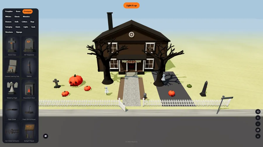 A two-storey house with pumpkins, ghosts, gravestones and an obelisk on the lawn, beside a shelf of graveyard pieces