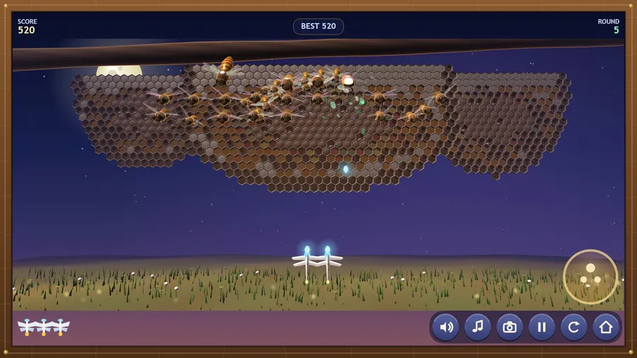 Classic view, round 5: two origami dragonflies fly side by side under the honeybee swarm on its comb