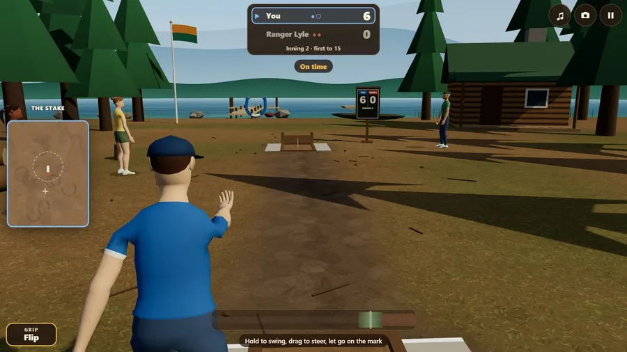 Over the shoulder at the lakeside camp: a shoe just out of the hand, turning toward the far stake.