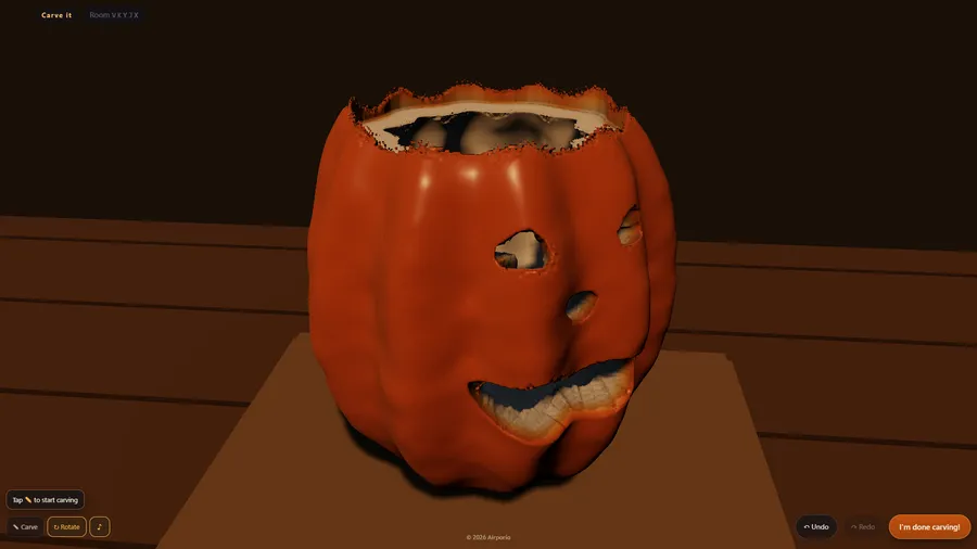 The carved pumpkin turned to one side, showing its hollow inside through the open top and its cut face