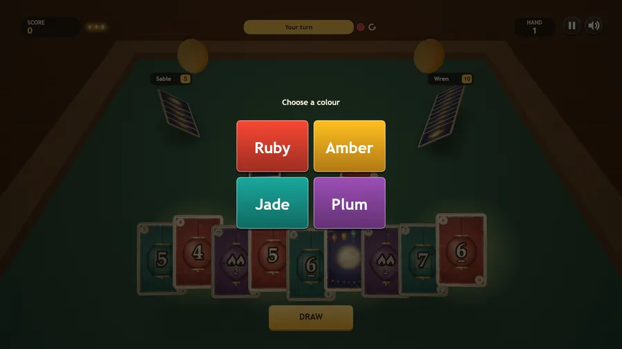 A colour picker with Ruby, Amber, Jade and Plum buttons opens after the player plays a wild prism card.