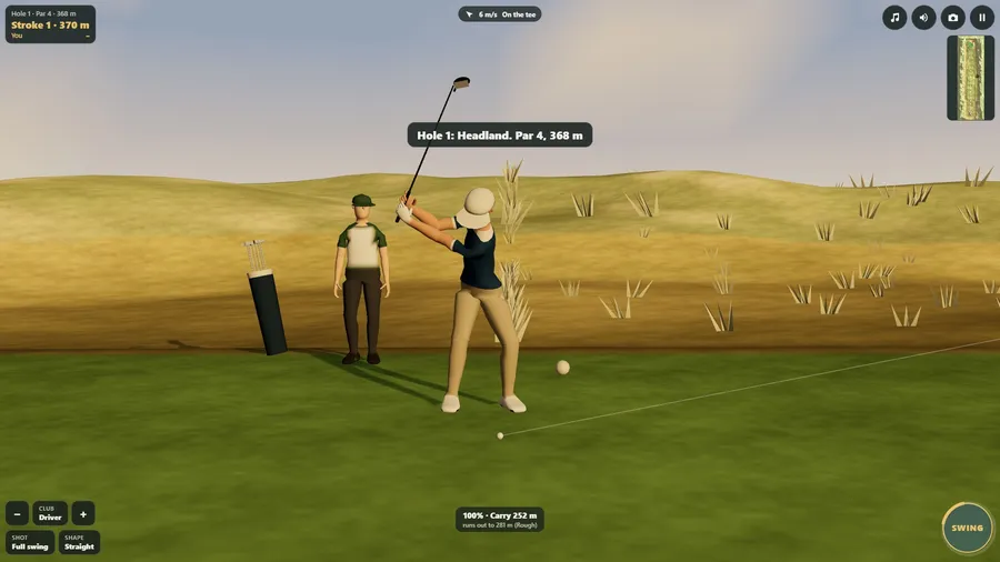 Side view of a golfer at the top of the swing on Kittiwake Head in evening light, the caddie and the bag behind.