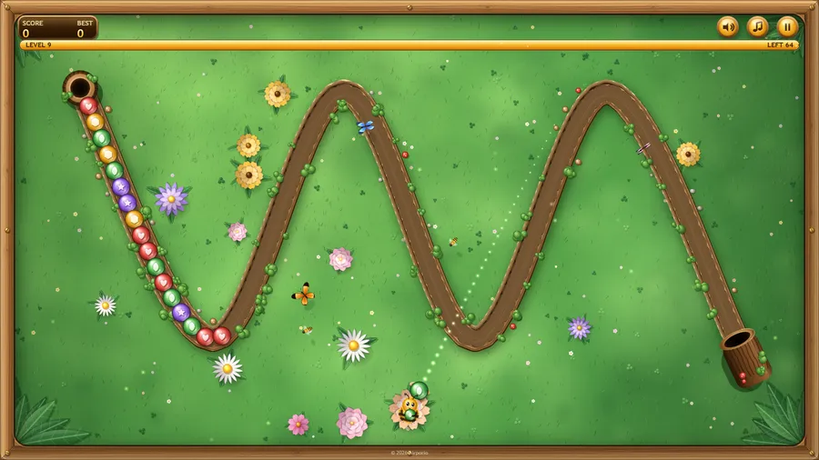 Level 9: a zigzag trail with a long chain of orbs descending the first slope toward the launcher.
