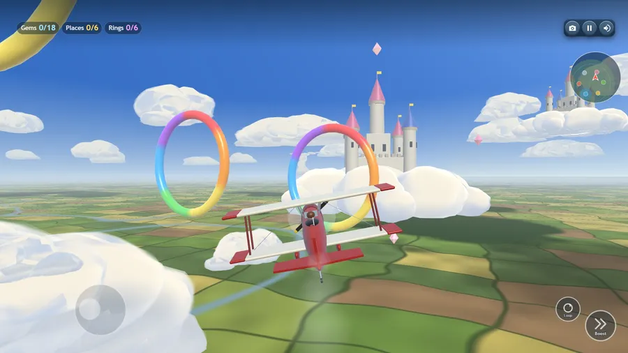 Close camera in Free Flight: the red biplane heads for the Cloud Castle past rainbow rings and clouds