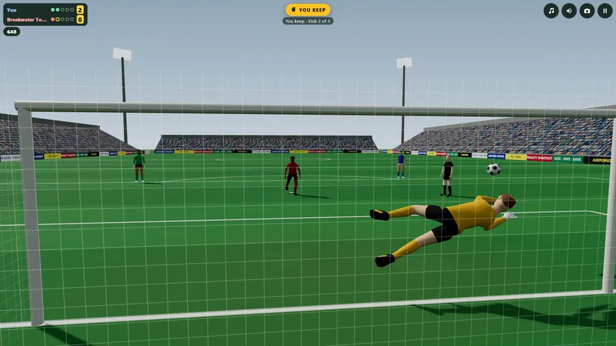 Behind your keeper at Harbour Park, through the net: at full stretch to the right as the ball arrives, the kicker beyond.