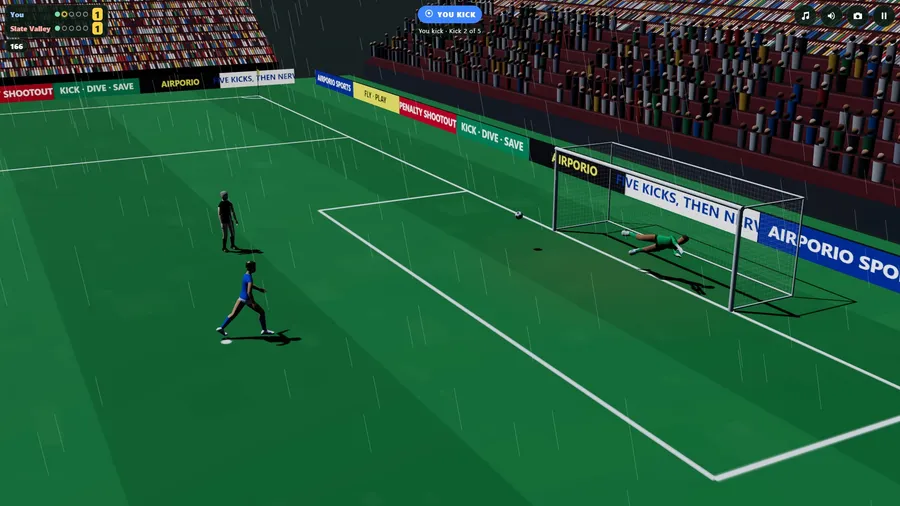 A wet night at Slate Road from the television camera: the ball has just passed the diving keeper and crossed the line.