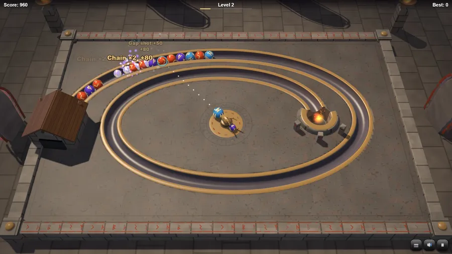 Level 2 spiral: a Chain ×2 reaction and a gap shot score as the chain coils towards the fire-pit altar