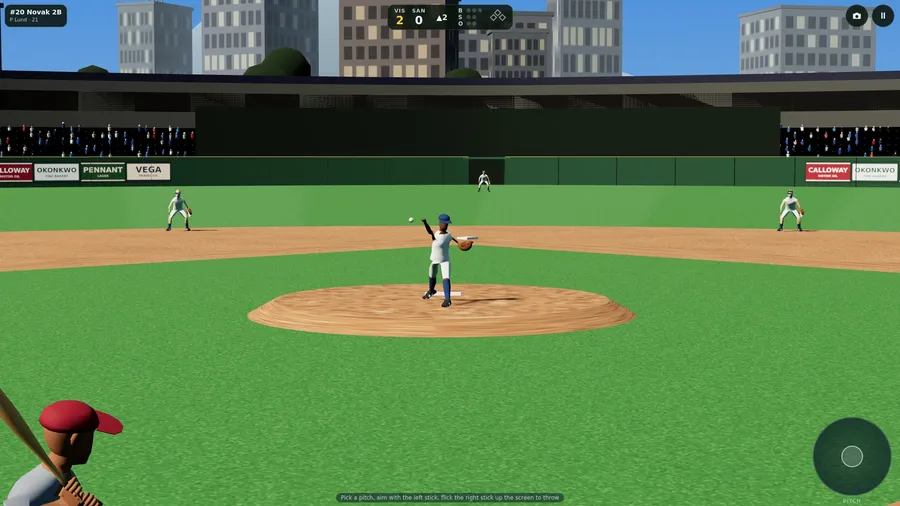 Pitching, seen from behind the batter: the ball leaves the pitcher's hand, infielders set and the city skyline beyond
