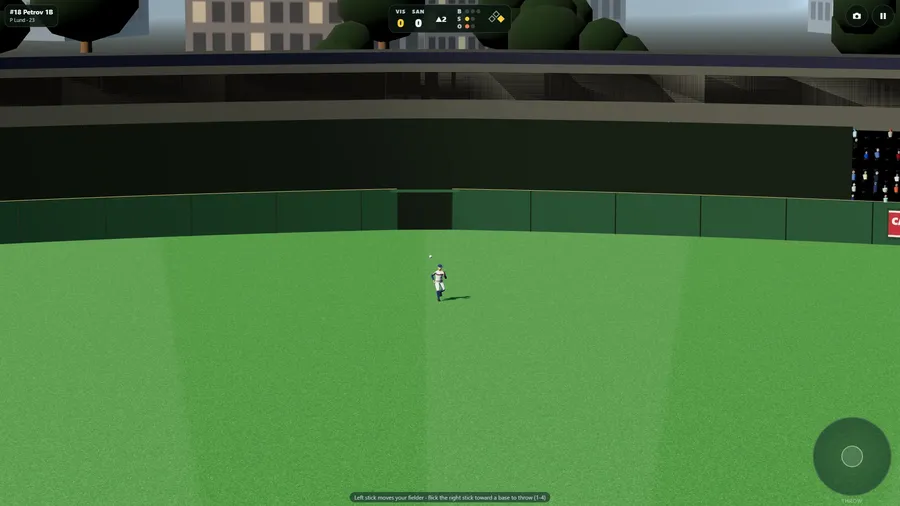 Fielding: an outfielder alone in deep center, the outfield wall and scoreboard, city towers beyond