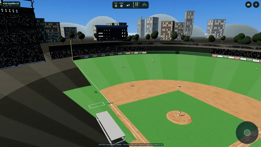 Fielding, high above the third-base stands: the whole ballpark, outfielders spread out, the scoreboard and the city beyond