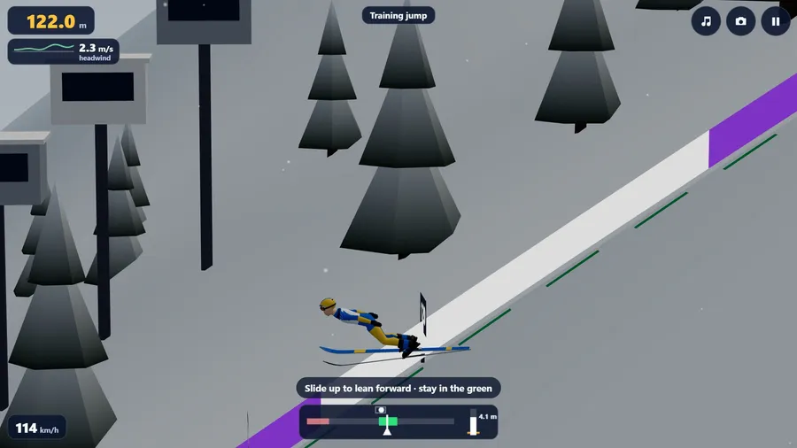 From beside the hill, a jumper in blue lies flat over long skis high above the slope of a ski-flying hill.