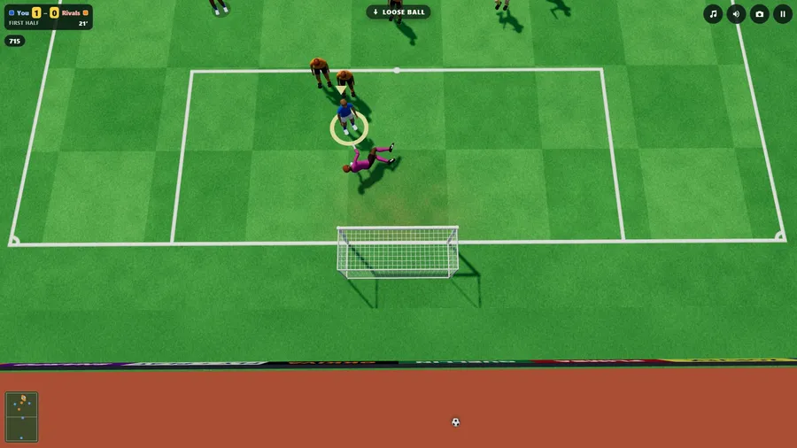 Seen from behind the goal in a small stadium: the keeper in pink dives at the feet of a blue forward as a goal goes in.