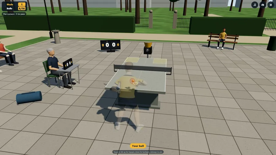 A challenge at The Park: a concrete table, the ball machine at the far end and two target zones in the corners.